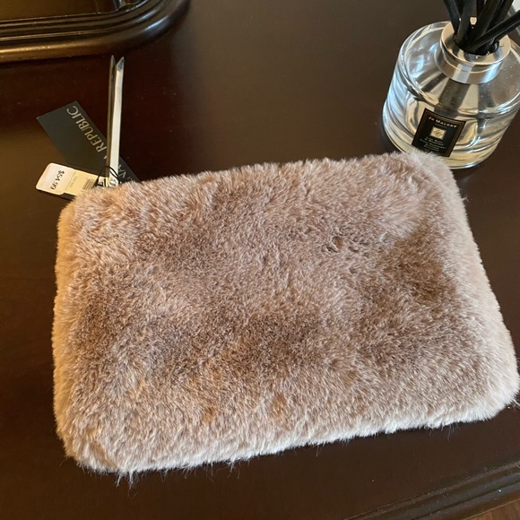 Banana Republic Handbags - Banana Republic Faux fur clutch